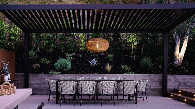 Beautiful pergola covering a luxurious outdoor dining area